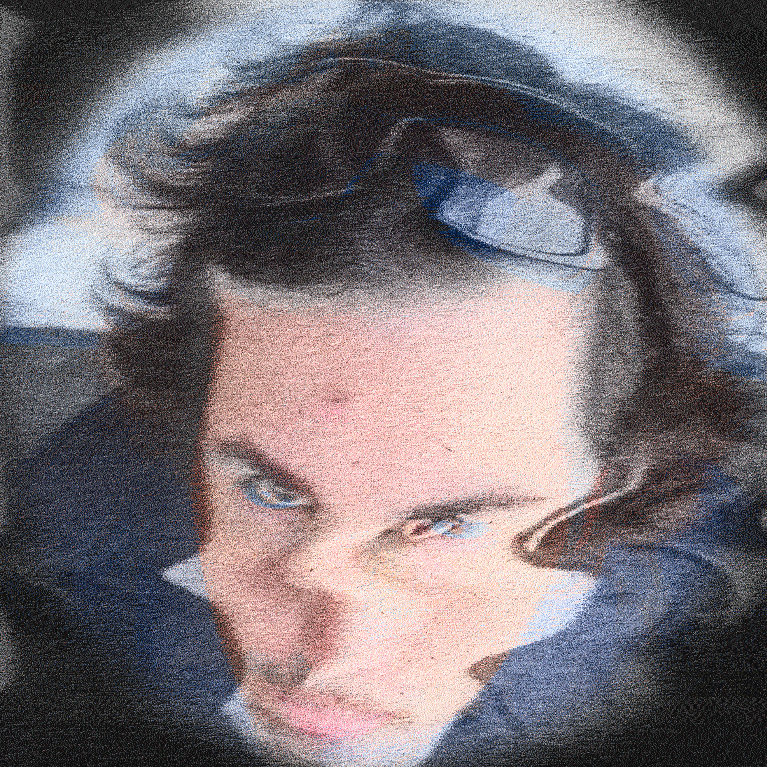 portait of a 22 year old boy with dark hair, with a pixel art filter added to the photo